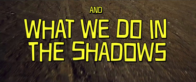 the words what we do in the shadows are yellow