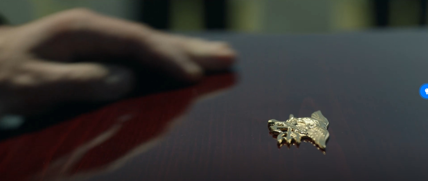 a close up of a person's hand on a table