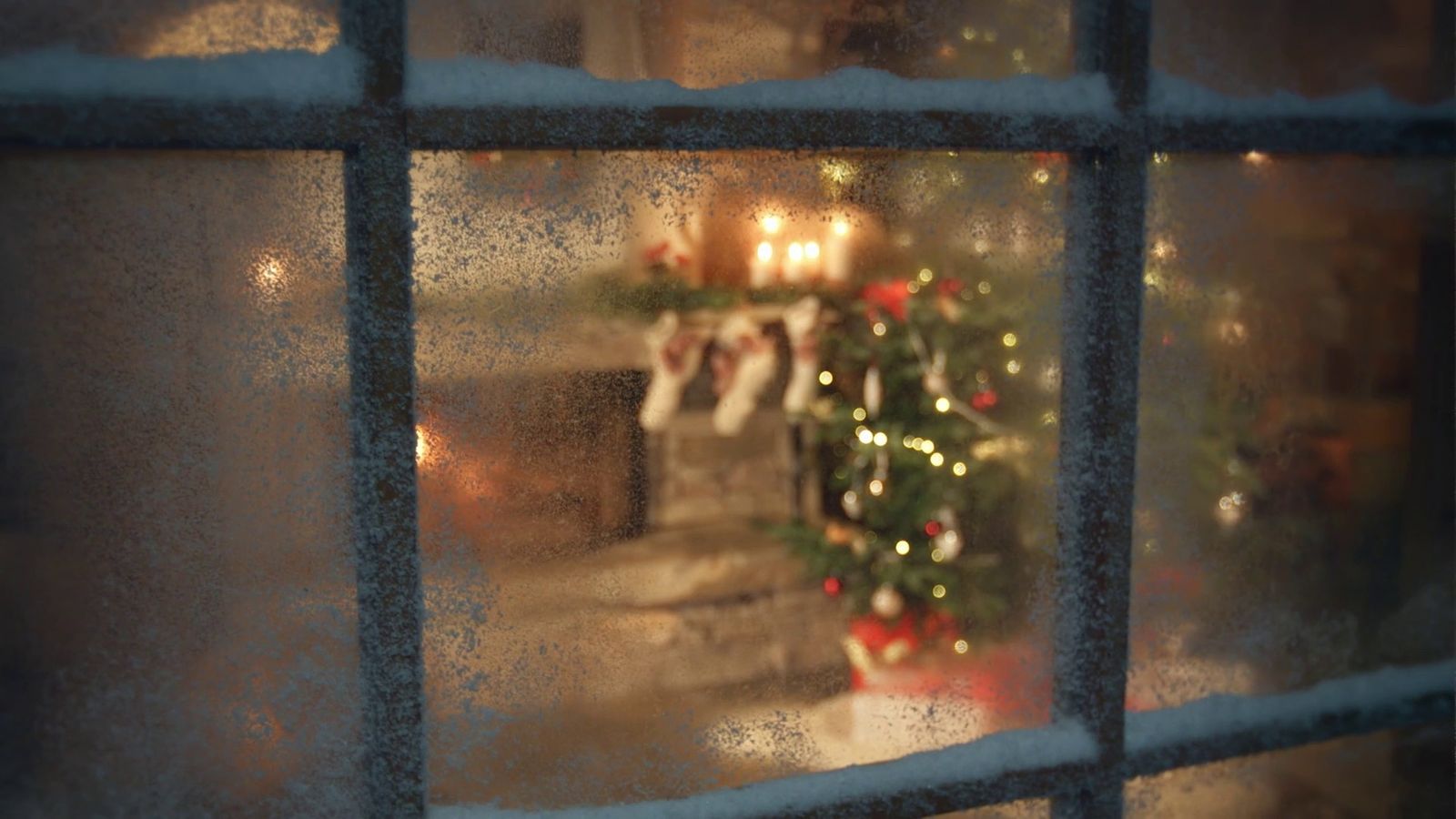 a view of a christmas tree through a window