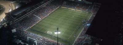 an aerial view of a soccer field at night