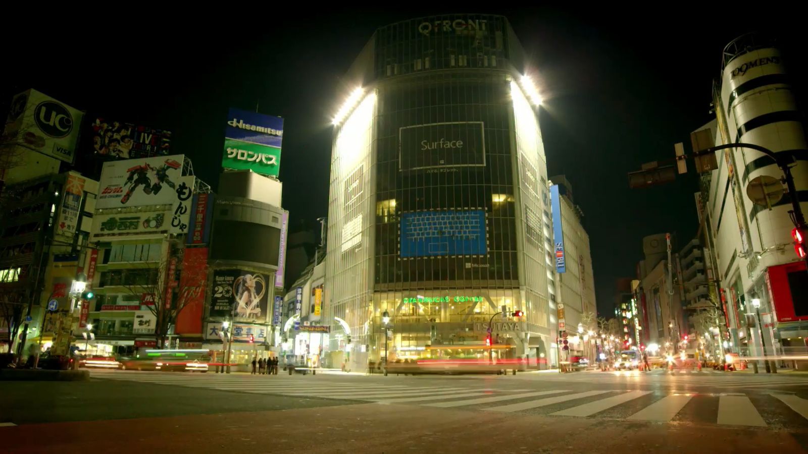 a city street with a lot of tall buildings