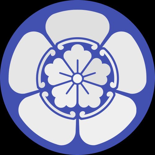 a blue and white flower in a circle