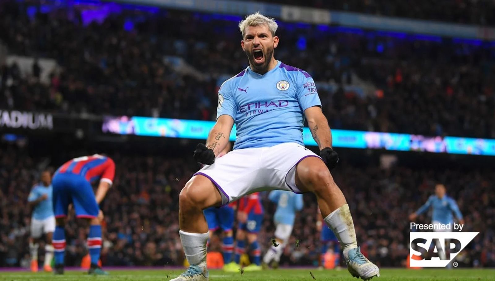 a soccer player celebrating a goal during a game