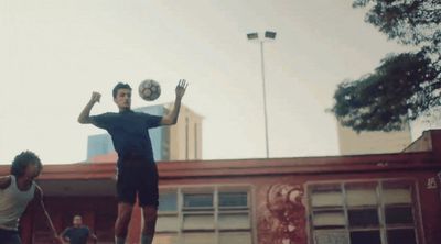 a couple of men playing a game of frisbee