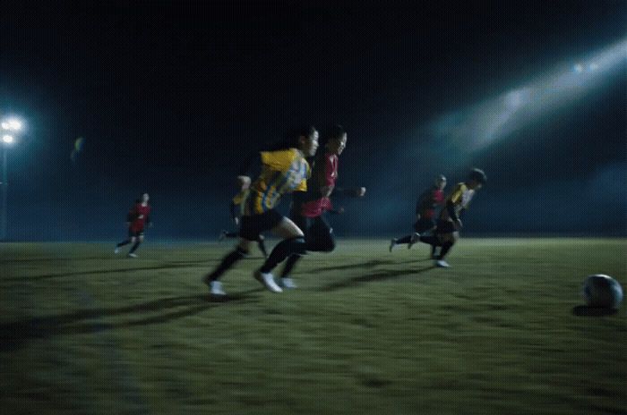 a group of young men playing a game of soccer