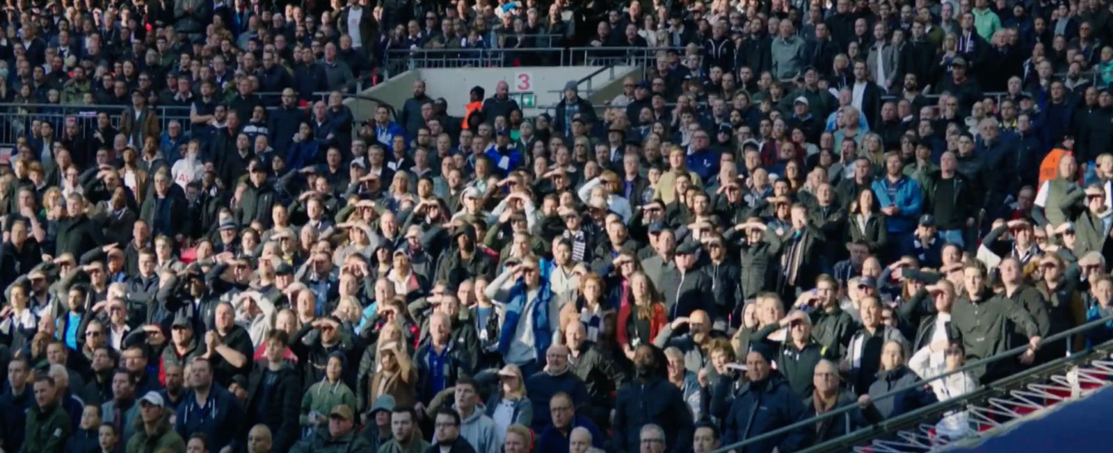 a large crowd of people at a tennis match