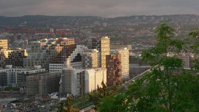 a view of a city with tall buildings