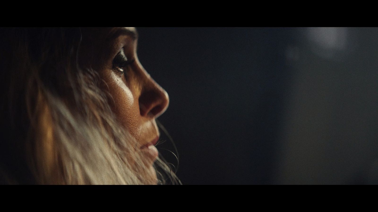 a close up of a person with long hair