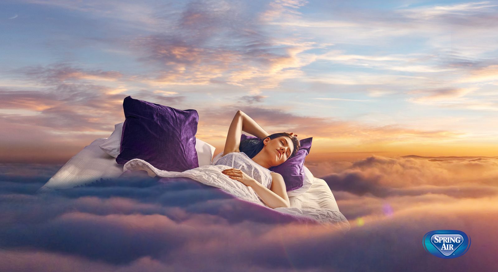 a painting of a woman laying in the clouds