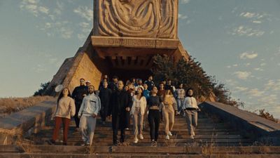 a group of people standing on a set of stairs