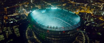 an aerial view of a stadium at night