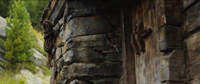 a close up of a door on a stone building