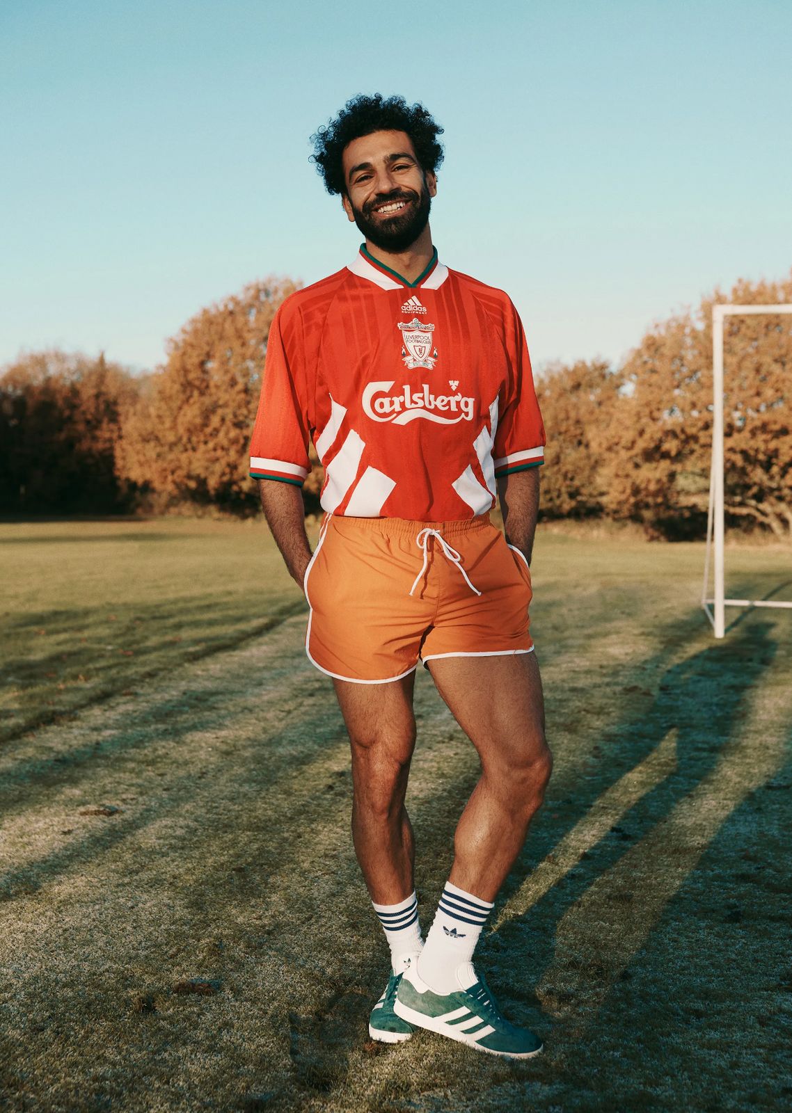 a man standing in front of a soccer ball