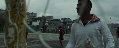 a man standing in front of a soccer goal