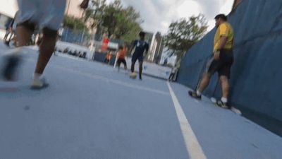 a blurry photo of a person riding a skateboard