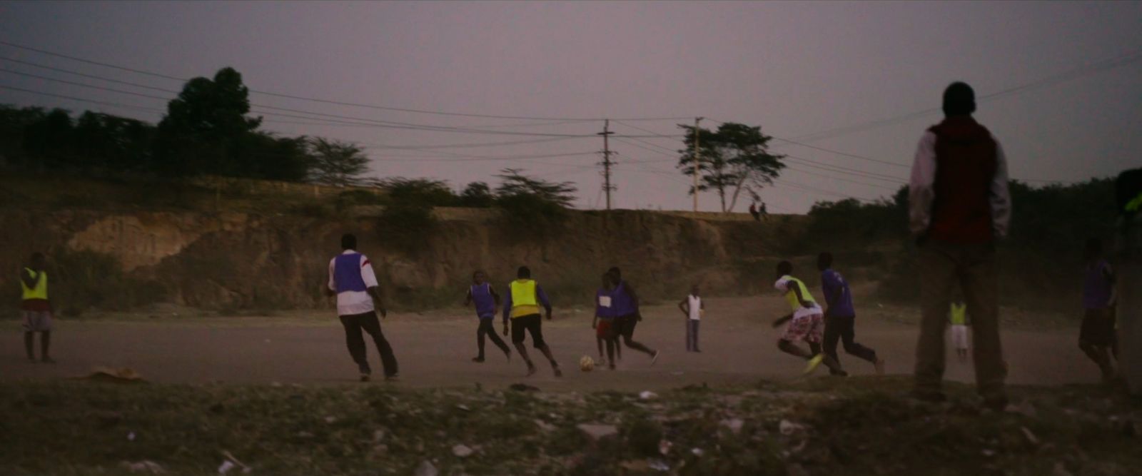 a group of young men playing a game of soccer