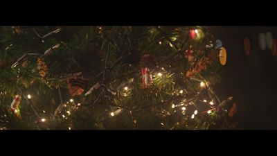 a close up of a christmas tree with lights