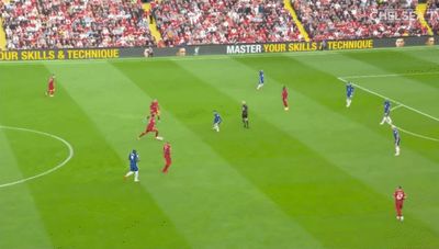 a group of people playing a game of soccer