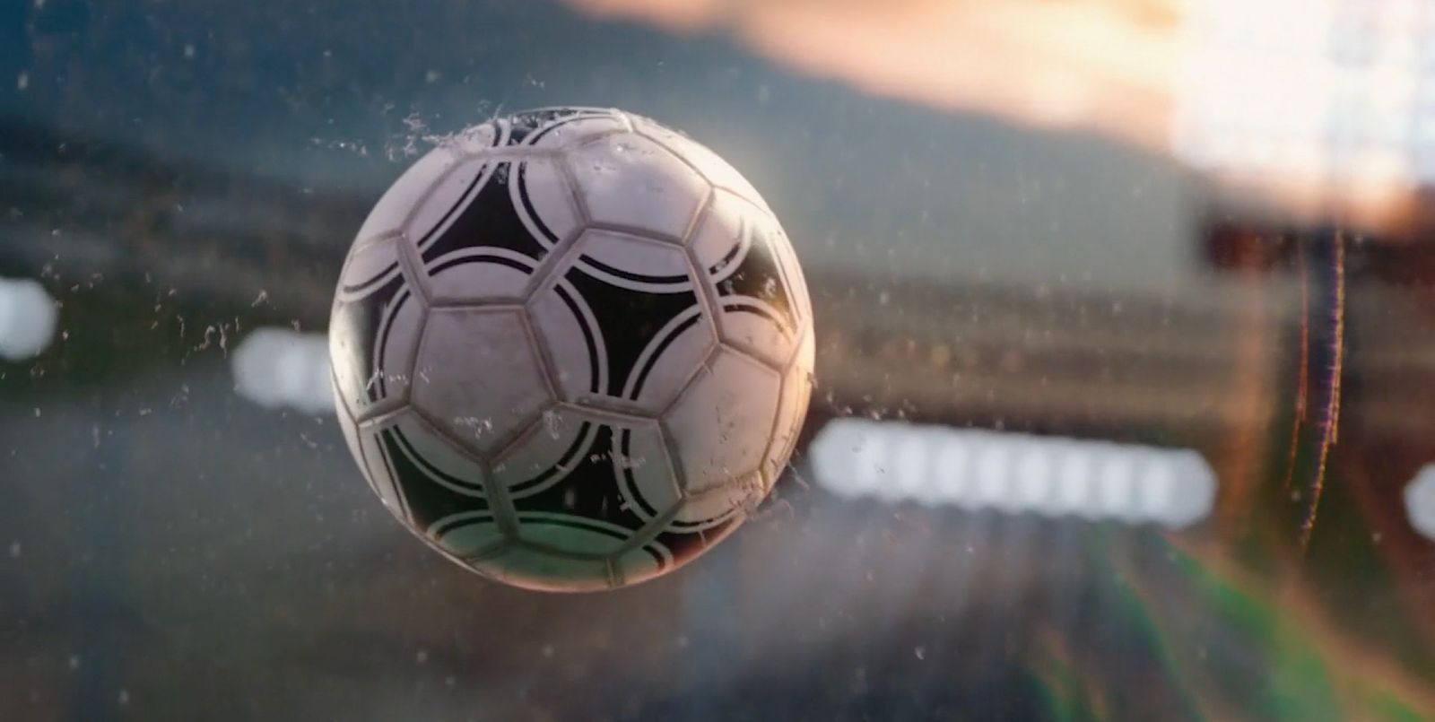 a close up of a soccer ball in a window