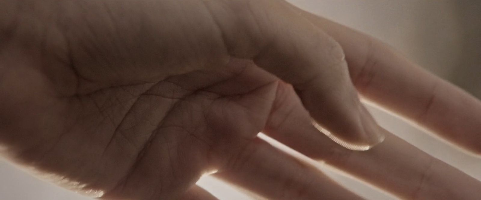 a close up of a person's hand holding something