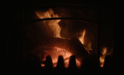 a close up of a fire burning in a fireplace