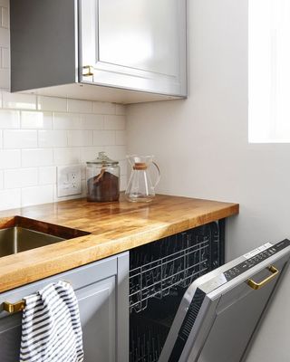 a kitchen with a dishwasher and a sink