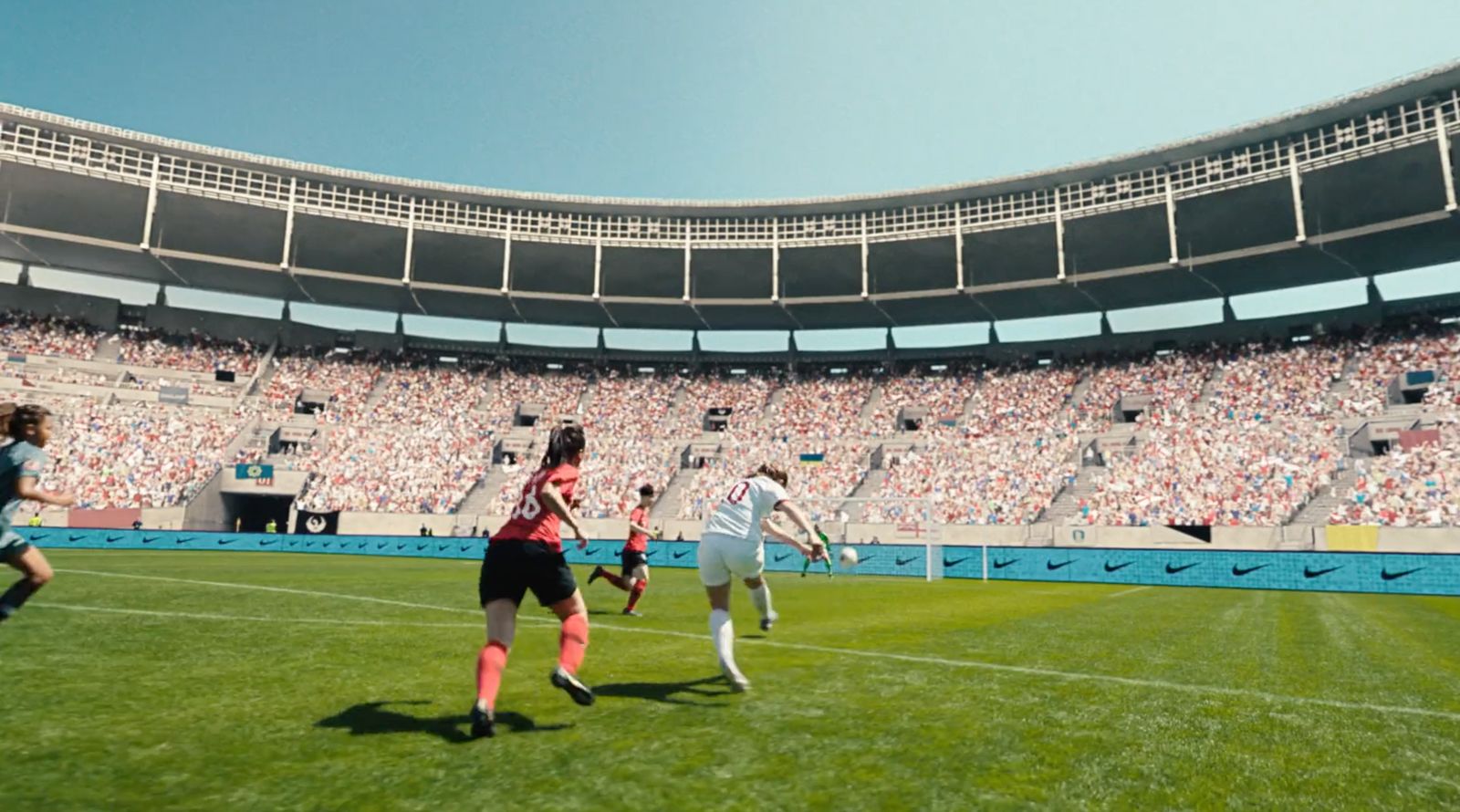 a group of people playing a game of soccer