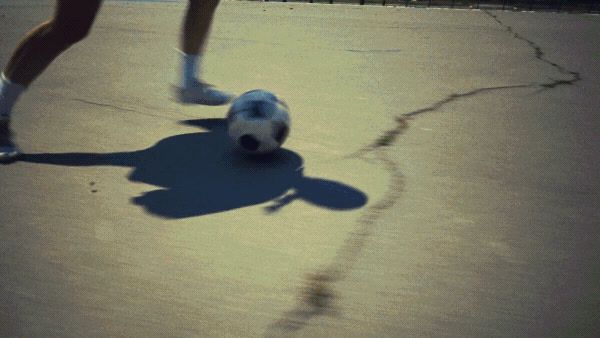 a person is playing with a soccer ball