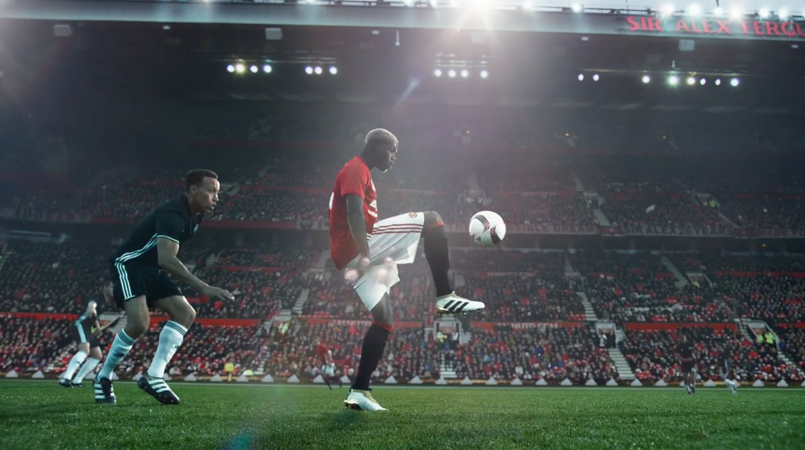 a group of men playing a game of soccer