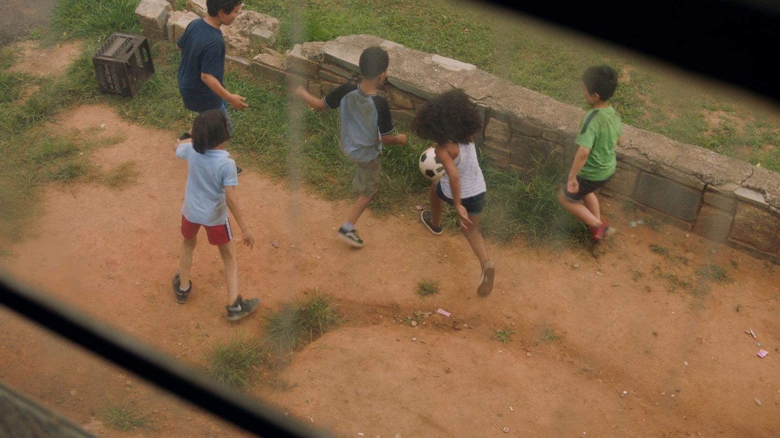 a group of young children standing next to each other