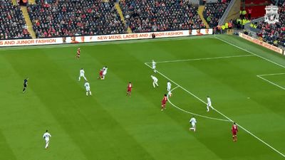 a group of people playing a game of soccer