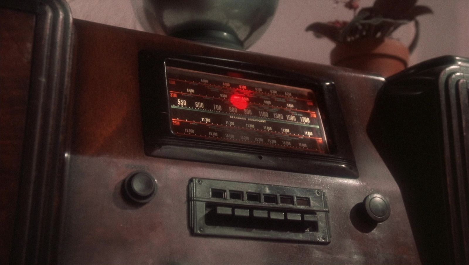 a radio sitting on top of a wooden table