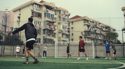 a group of young men playing a game of soccer