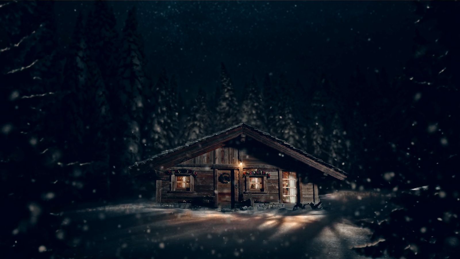 a cabin in the middle of a snowy forest