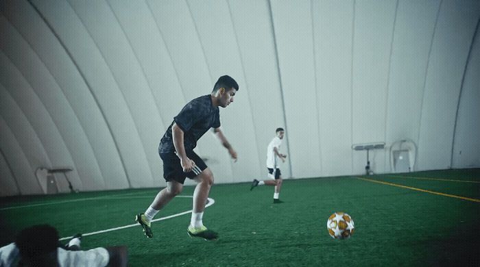 a group of young men playing a game of soccer