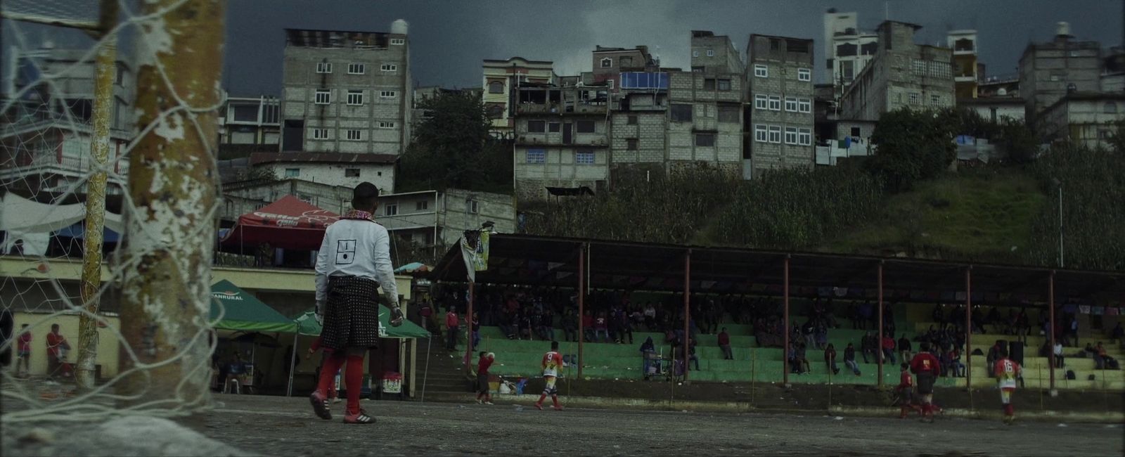 a group of people playing a game of soccer