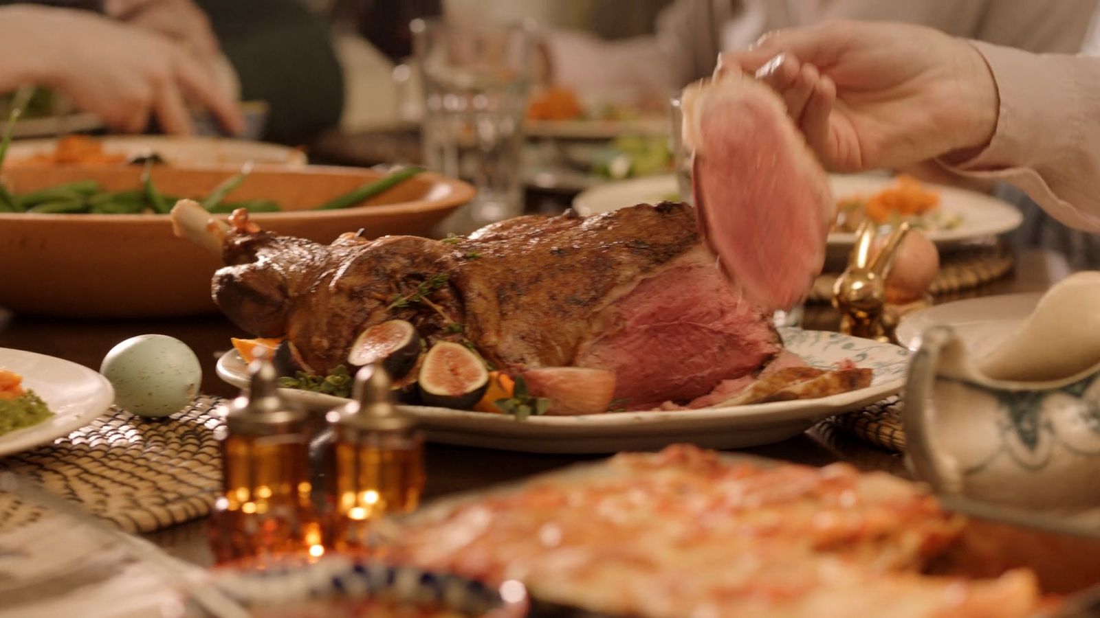 a table with plates of food and plates of food on it