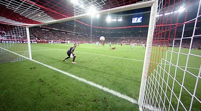 a soccer goalie getting ready to kick the ball