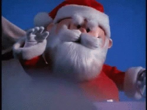 a close up of a santa clause holding a surfboard