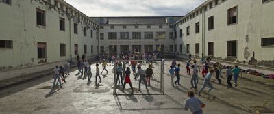 a group of people playing a game of soccer