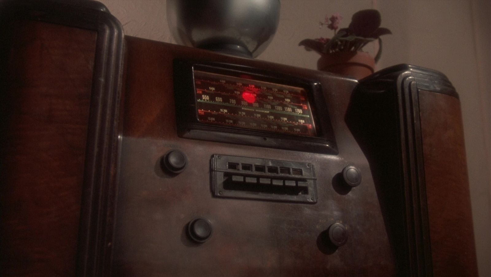 a radio sitting on top of a wooden table