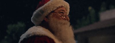 a man wearing a santa claus hat and glasses