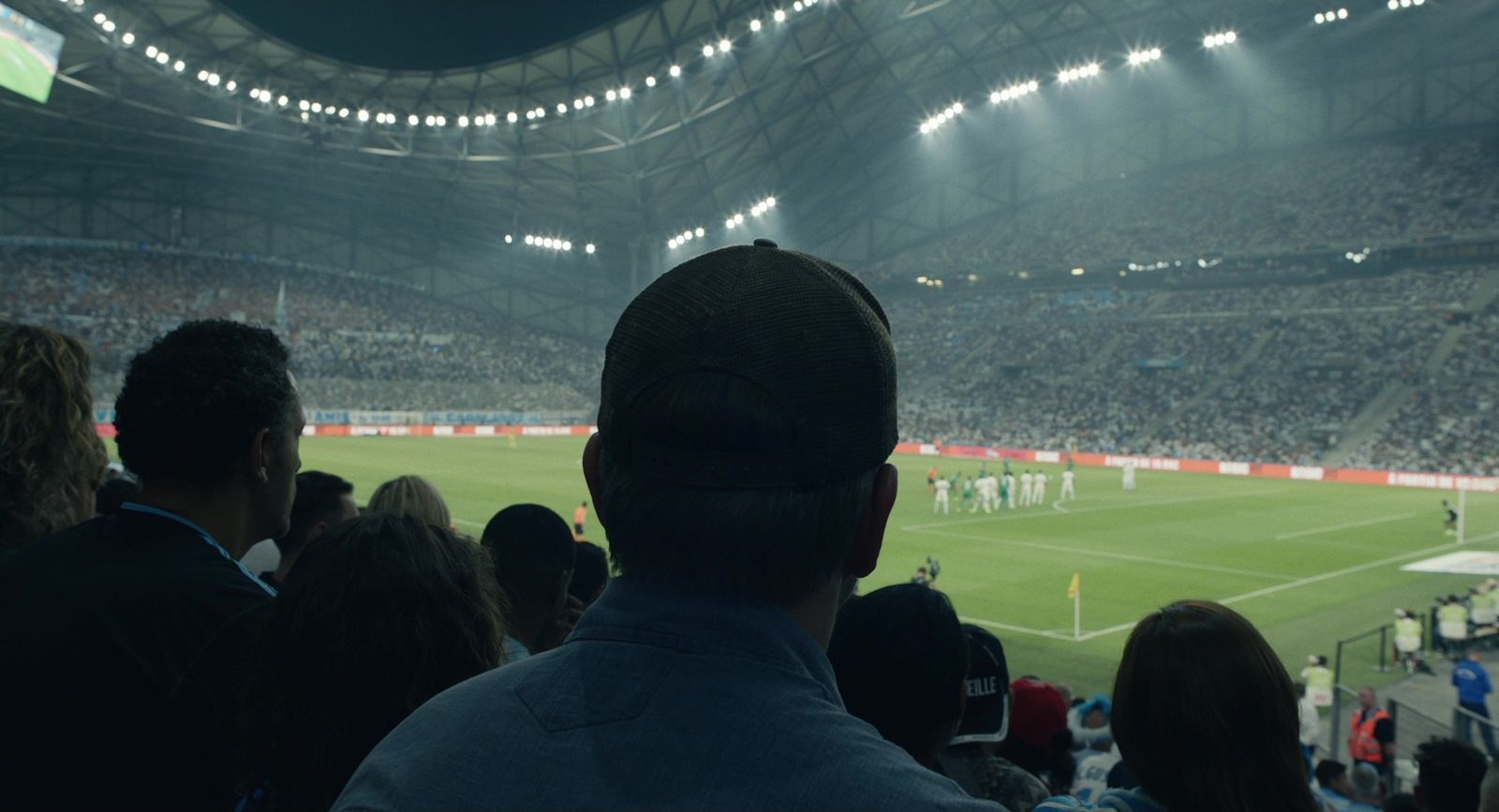 a stadium full of people watching a soccer game