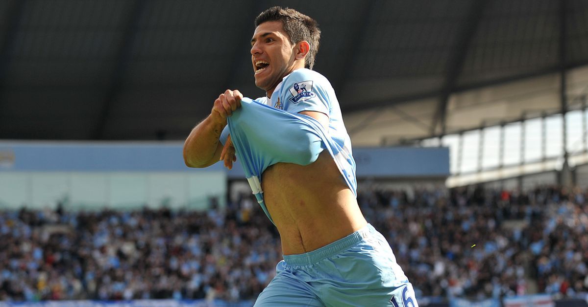 a man in a blue uniform celebrates a goal