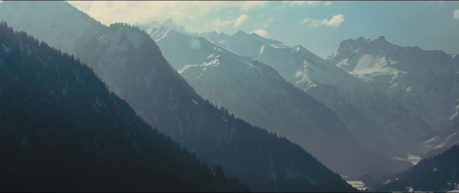 a view of a mountain range from a distance