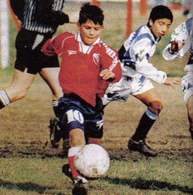 a group of young men playing a game of soccer