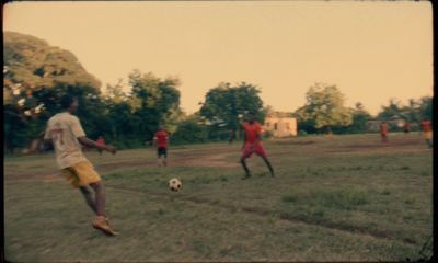 a group of young men playing a game of soccer