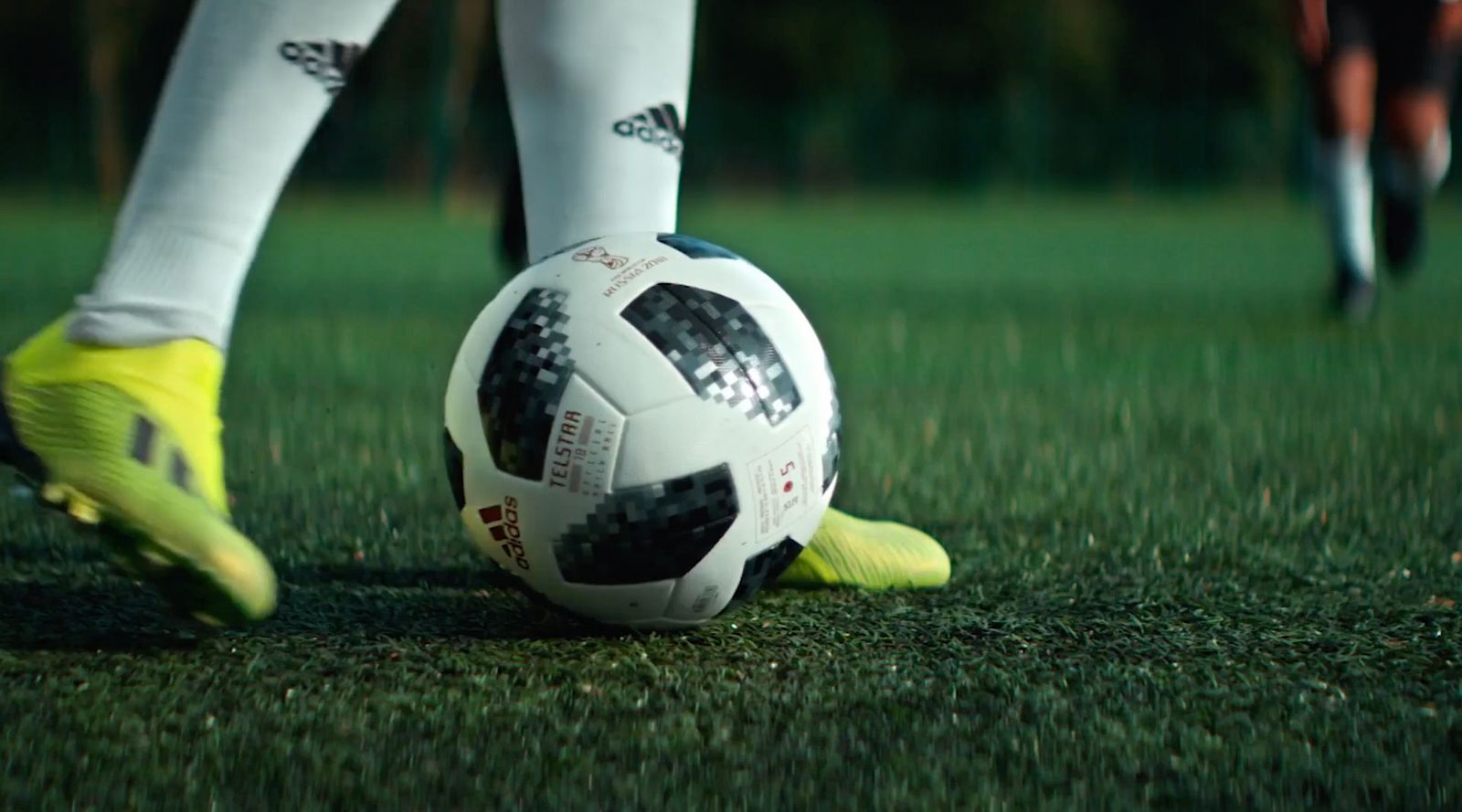 a close up of a soccer ball on a field