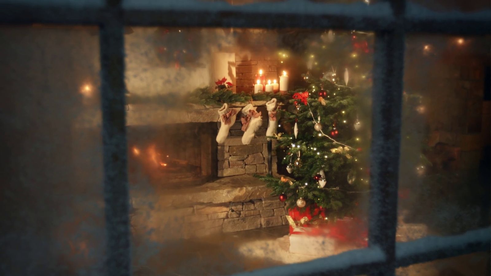 a view of a christmas tree through a window