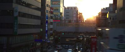 a city street filled with lots of tall buildings